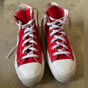Red high top converse platforms